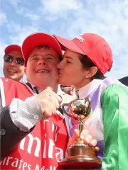 Victorious Michelle with Stevie with the cup